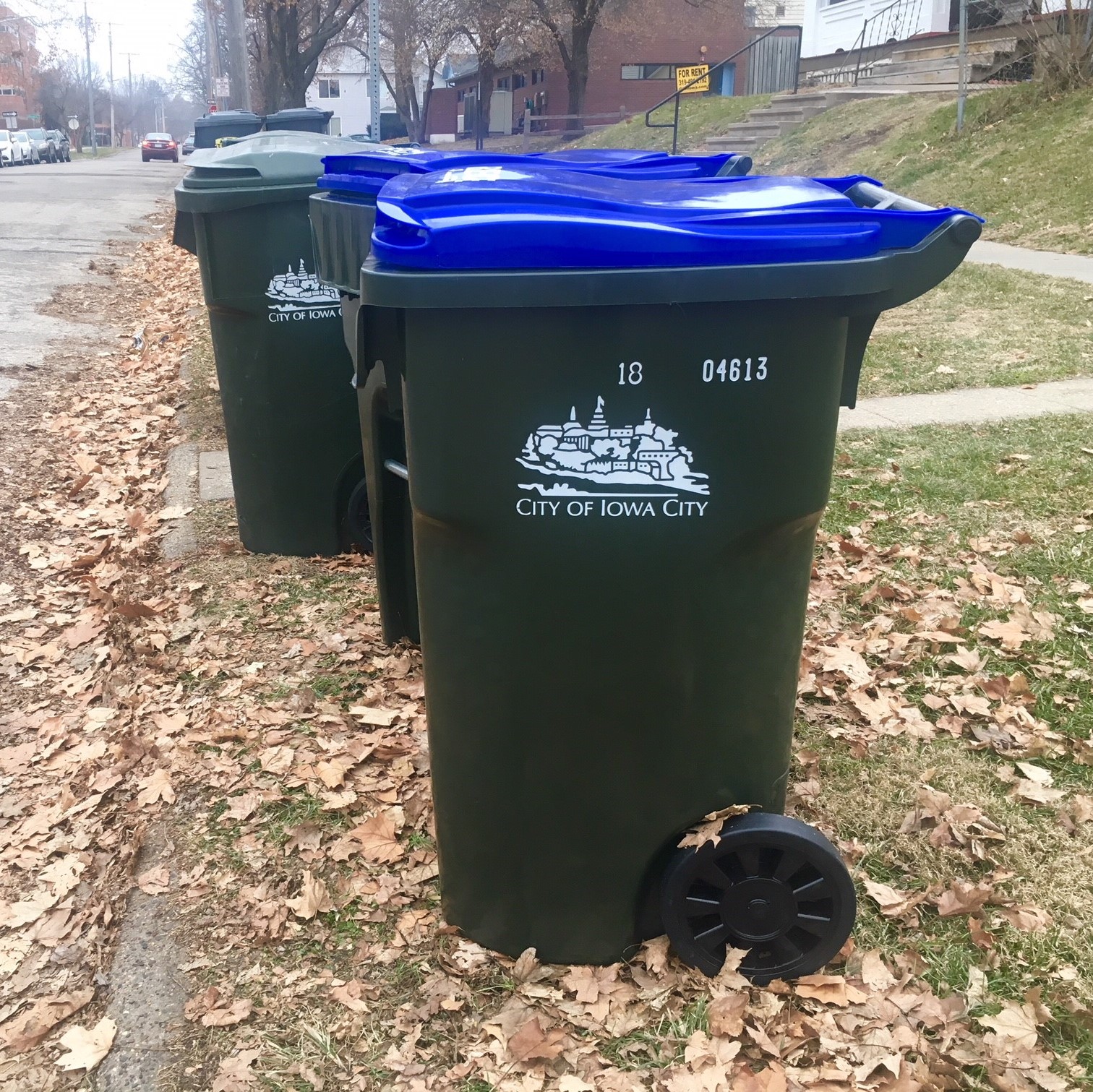 A recycling cart is shown