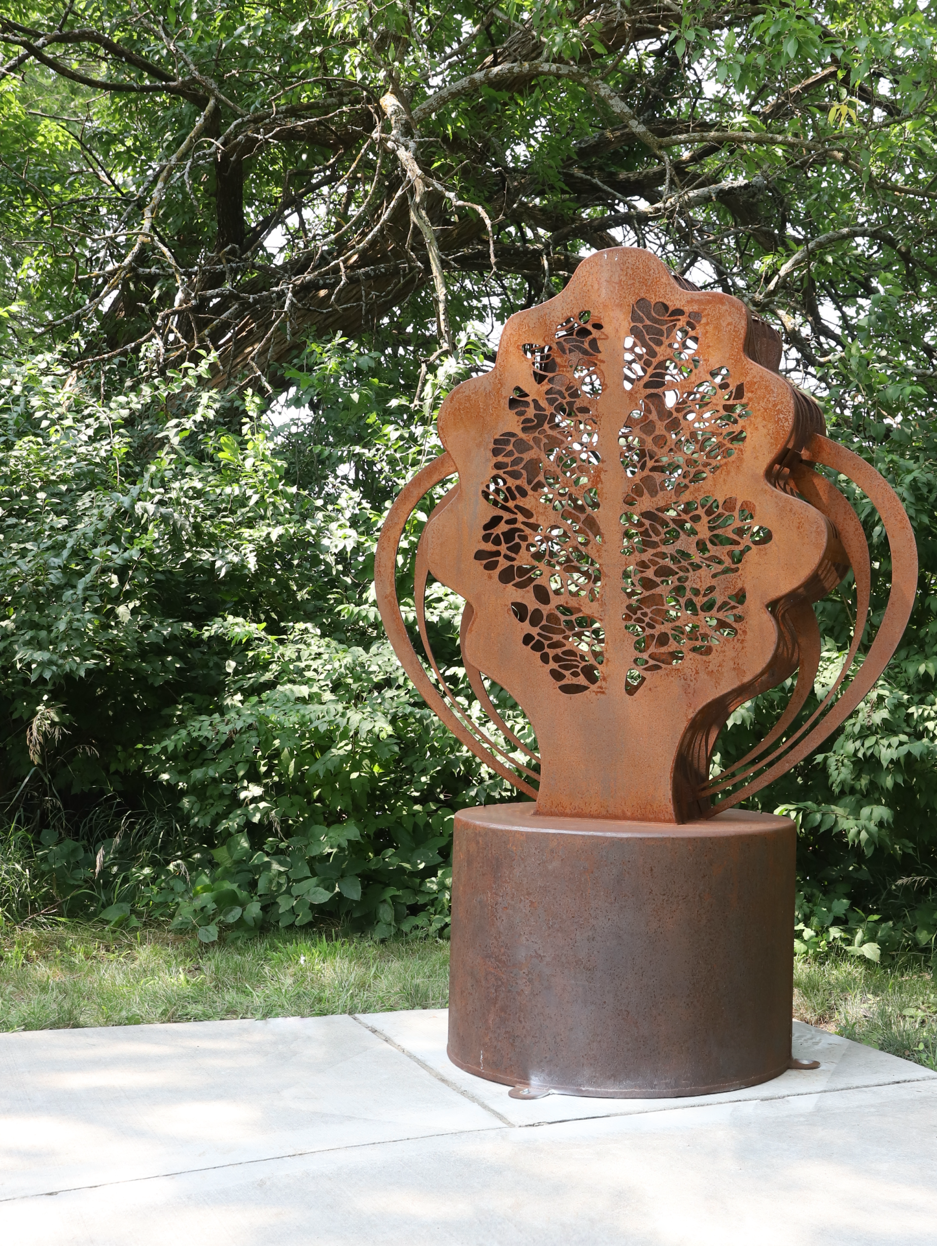 Steel leaf sculpture along a trail